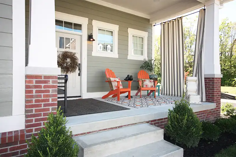 classic porch & front door decor of adirondack chairs